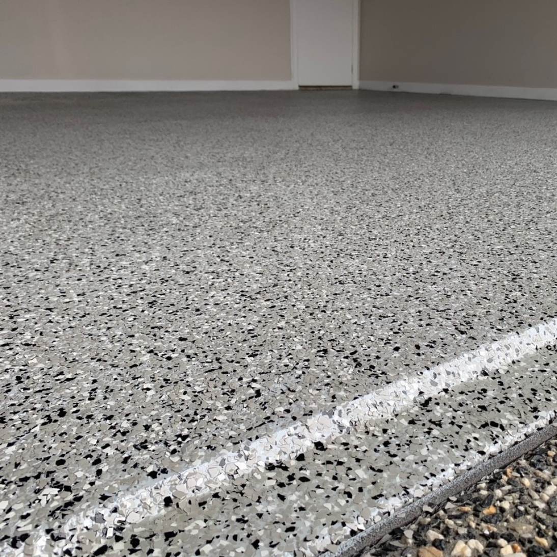 Epoxy flake floor coating in a Perth garage