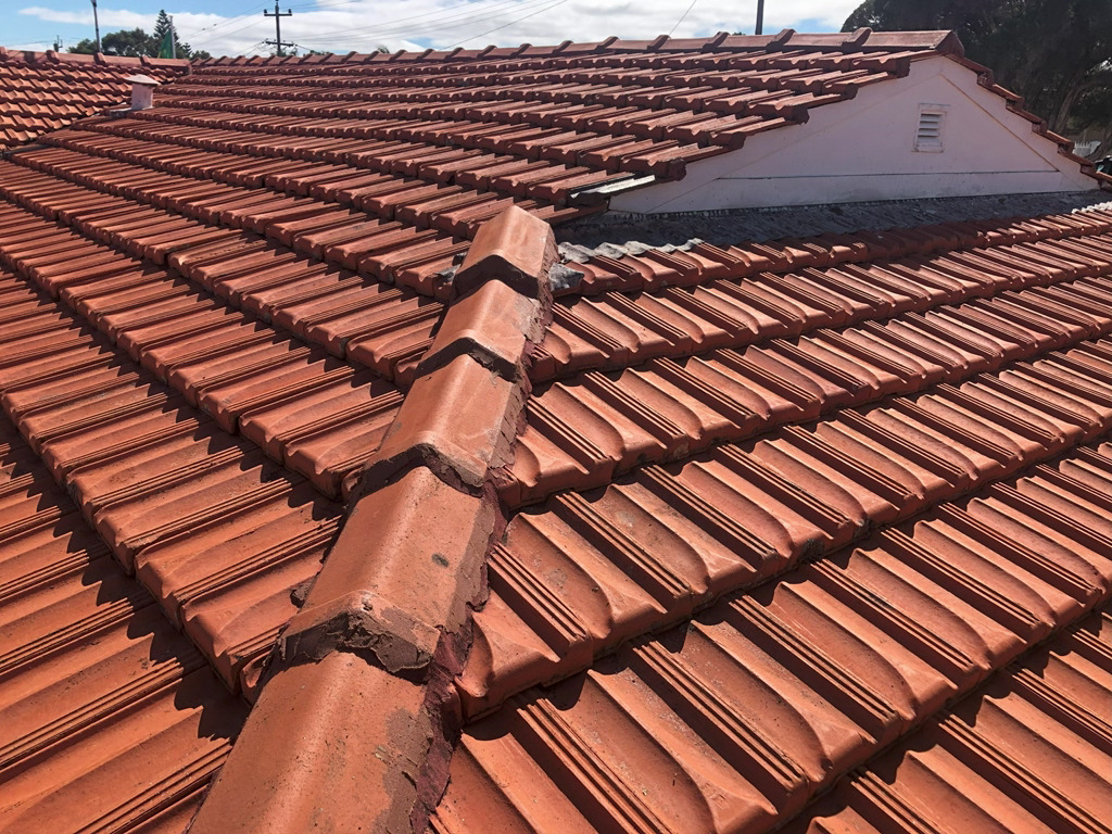 Repaired ridge tile pointing