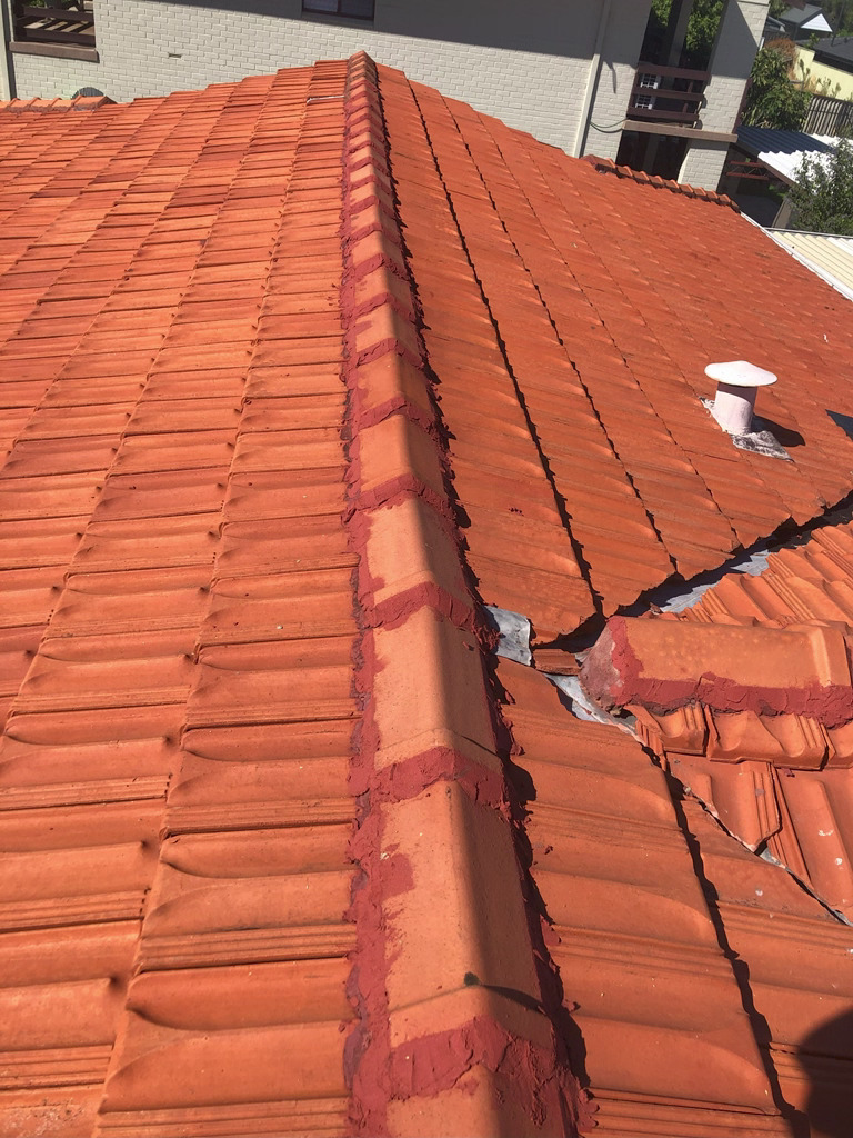 Repaired ridge tile pointing