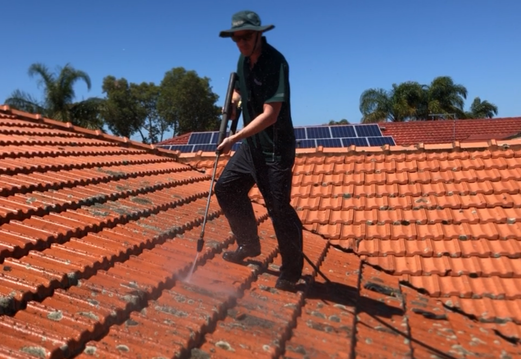 Roof cleaning with high-pressure washer in Woodvale WA