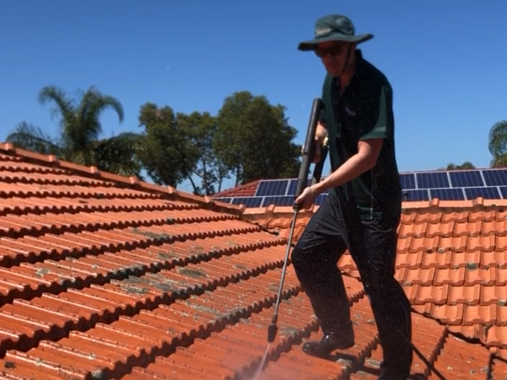 Roof cleaning with high-pressure washer in Woodvale WA